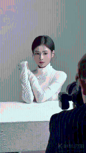 七七